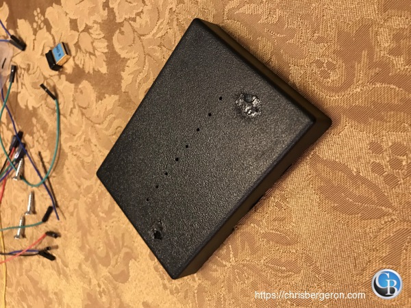 Pilot holes drilled in the case