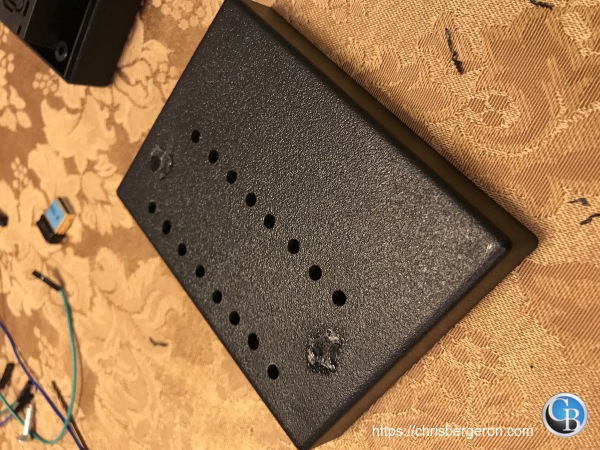 Pilot holes drilled in the case