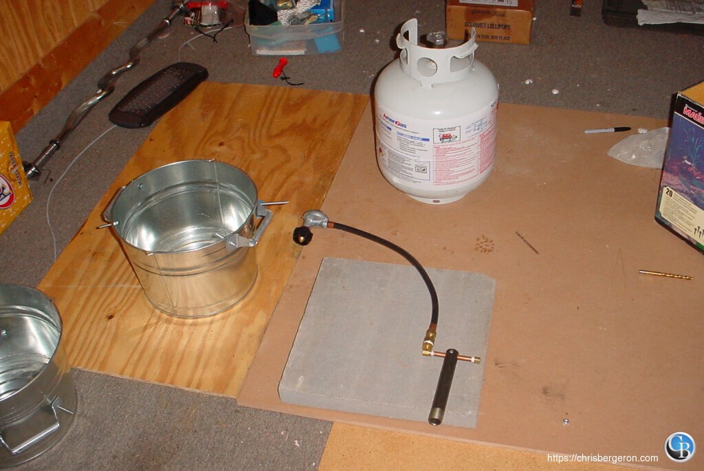 The burner and regulator; and the buckets used for the furnace